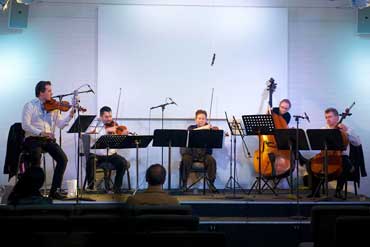 Vov Dylan Viennese Salon Orchestra performing in Humph Hall