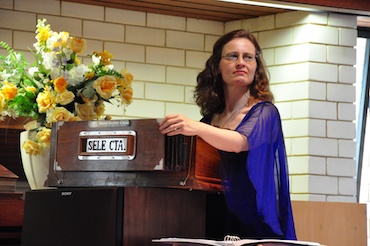 Gial Leslie playing the harmonium