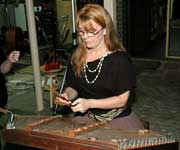 Jackie Luke playing the hammered dulcimer