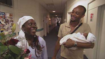 Still from movie 'Sicko' showing two health workers